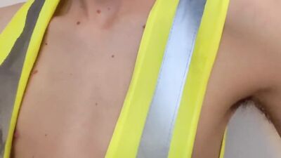 Teen boy has fun with the reflective jacket