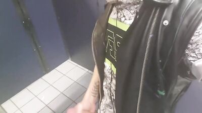 Stranger reaches under stall to grab Daniel Hausser's cock