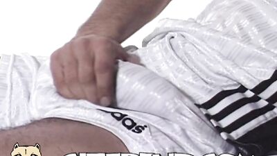 Footballers Muscle Bound Body Exhibits His Huge Dong Through His Nylon Football Jersey!